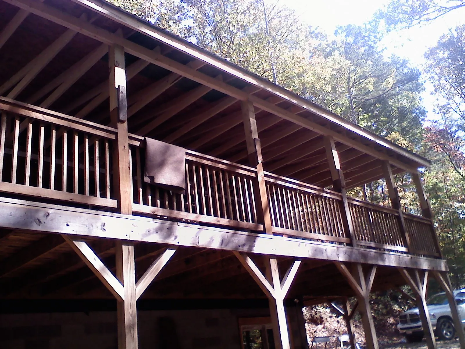 Timber framing under a new elevated porch and deck — Roof Leak Repair in Summerfield by Roofing Brothers